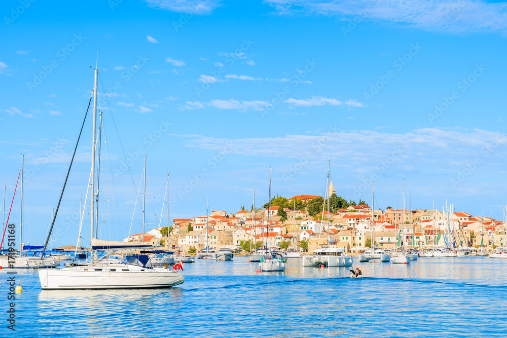 Sailboats on sea water in Primosten town, Dalmatia, Croatia