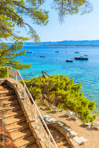 Steps to wonderful beach with turquoise sea water in Bol town  Brac island  Croatia