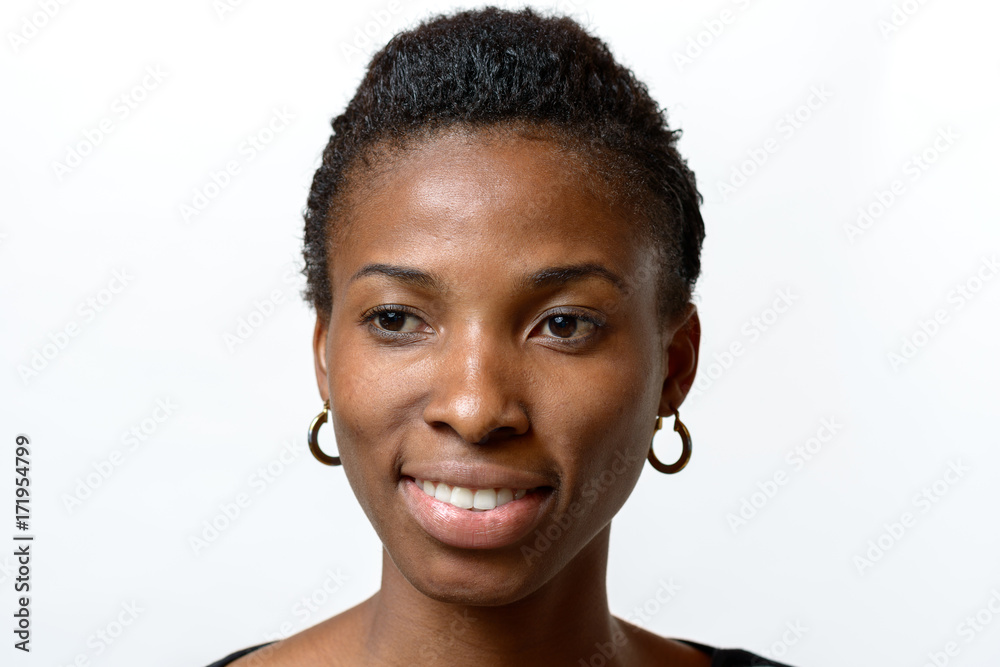 Attractive African woman with a lovely warm smile Attractive African woman with a lovely warm smile