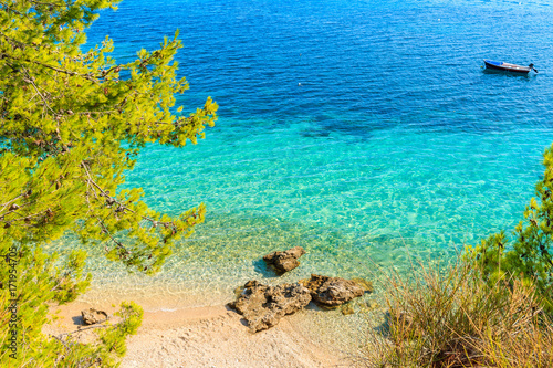View of stunning beach with turquoise sea water in Bol town, Brac island, Croatia