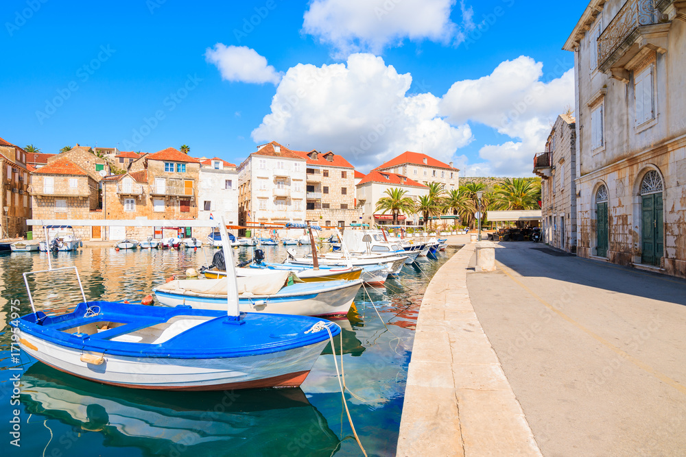 Fishing boats in Milna port on beautiful sunny summer day, Brac island, Croatia