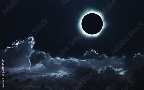 Fototapeta Naklejka Na Ścianę i Meble -  Solar eclipse. Deep space image, science fiction fantasy in high resolution ideal for wallpaper and print. Elements of this image furnished by NASA