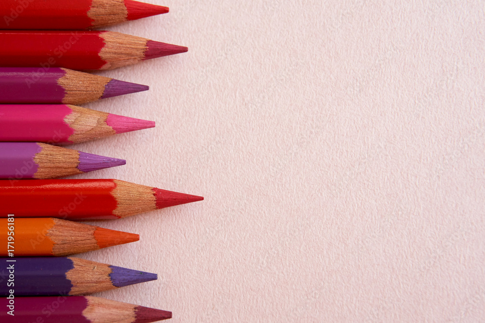 Background image made of red pencils.