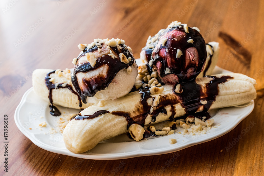 Banana Split with ice cream, chocolate sauce and Hazelnuts.
