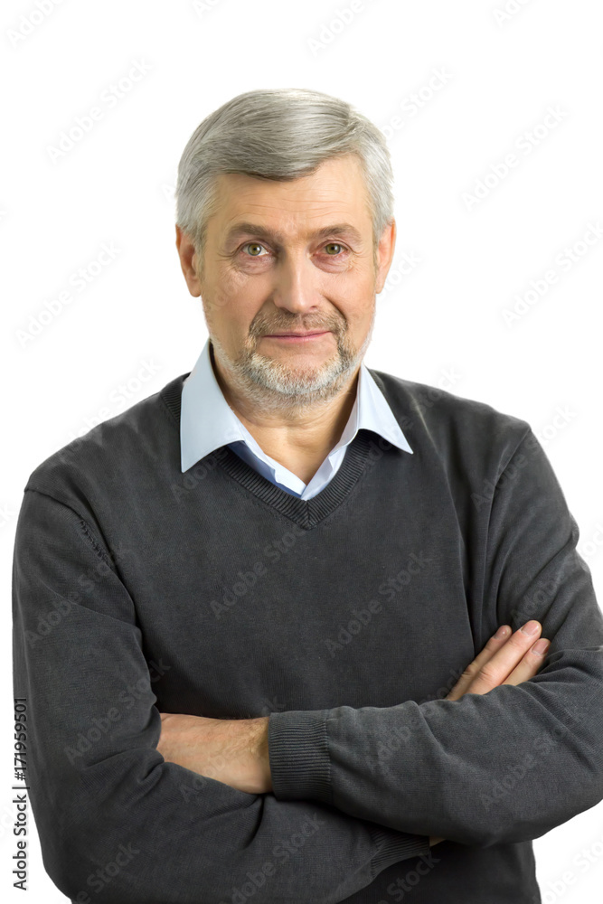Serious mature man with crossed arms. Portrait of late-middle-aged man with crossed arms on white background. Serious mature man with crossed arms. Portrait of late-middle-aged man with crossed arms on white background.
