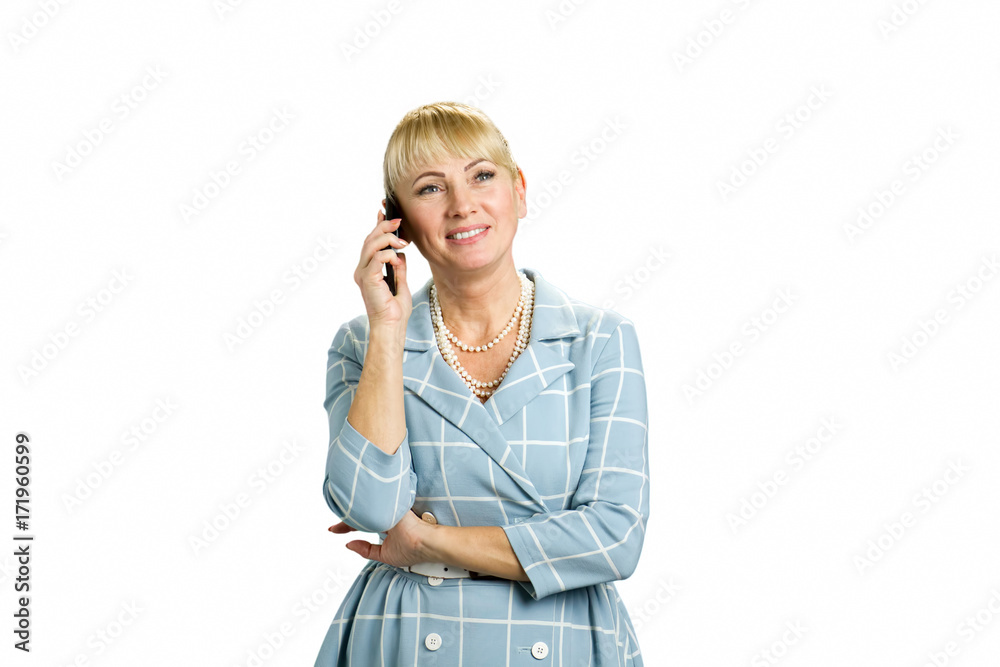 Middle aged woman talking on phone. Closeup portrait white-skin mature business woman happy, excited employee, using cell phone, smiling. Happy mid woman using mobile phone on white background.. Middle aged woman talking on phone. Closeup portrait white-skin mature business woman happy, excited employee, using cell phone, smiling. Happy mid woman using mobile phone on white background..