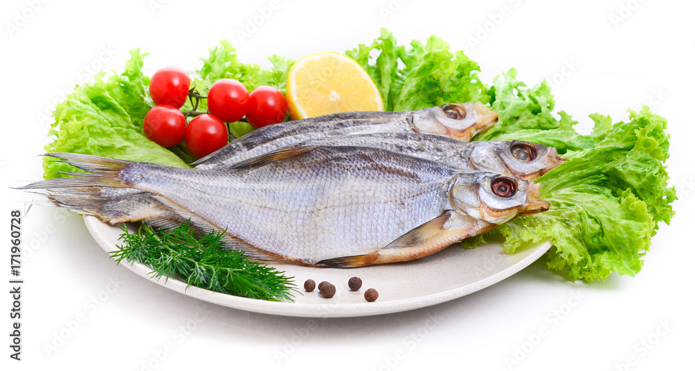 Dried roach ( Rutilus rutilus ) on a plate Dried roach ( Rutilus rutilus ) on a plate