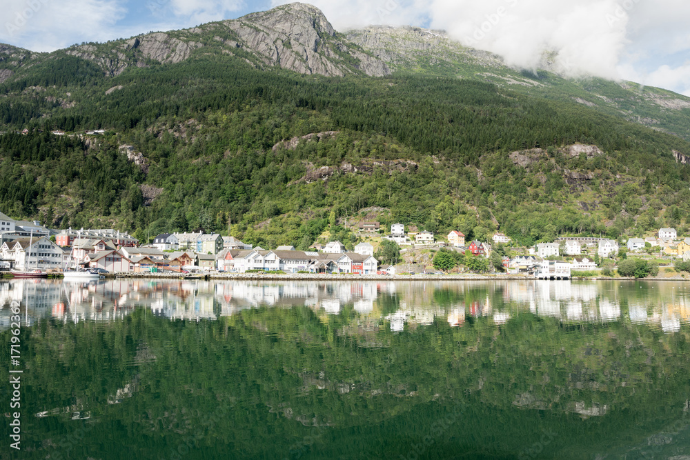 Odda Town with small houses on a Fjord in Summer, Norway