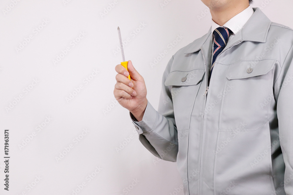 作業着 男性 ネクタイ ポーズ ドライバー Stock Photo Adobe Stock