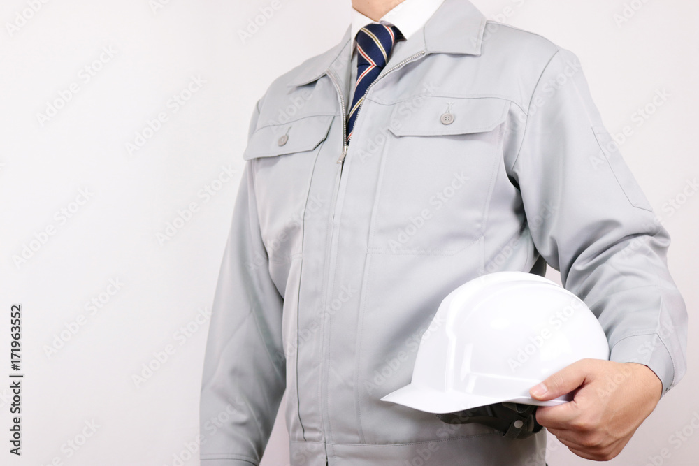 作業着 男性 ネクタイ ポーズ ヘルメット 持つ Stock 写真 Adobe Stock