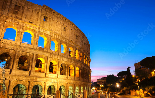 The legendary Coliseum at night , Rome, Italy photo