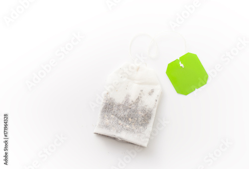 Herbal green tea bag on white background