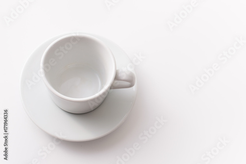 Empty white Cup of tea on white. Place for text.