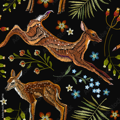 Embroidery deer, spring seamless pattern. Classical forest embroidery autumn leaves, spring flowers, deers outdoors seamless pattern. Fashionable template for design of clothes, t-shirt design