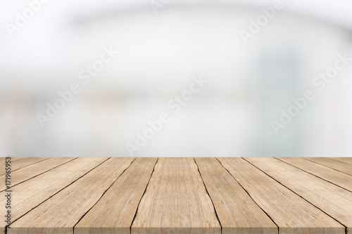 Wood table top on white blurred background from building,for montage your products