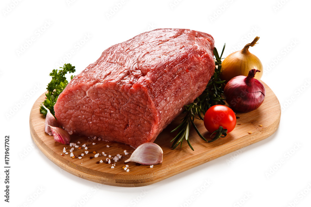 Fresh raw beef sirloin on cutting board on white background Fresh raw beef sirloin on cutting board on white background