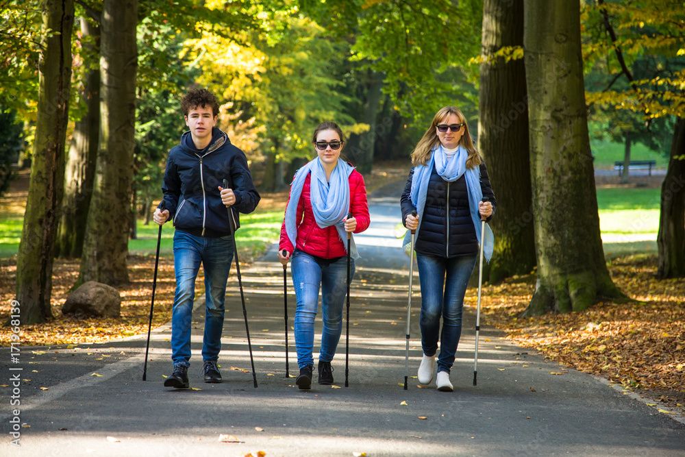 Nordic walking - active people working out 