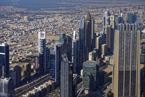 View of the skyline of the modern Dubai City, United Arab Emirates, with the low buildings of the original city in the background