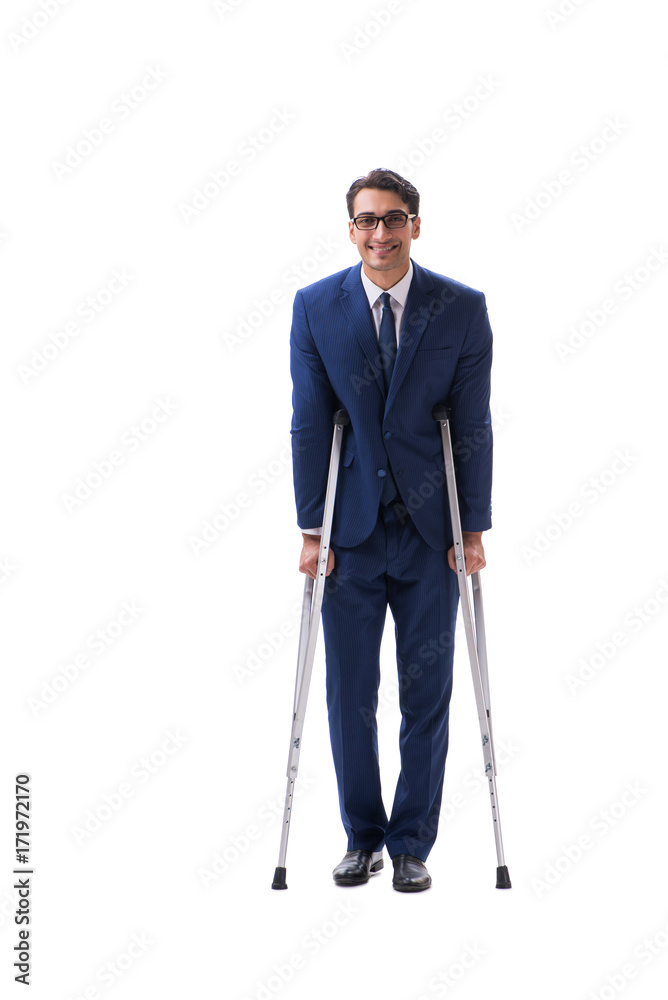 Businessman walking with crutches isolated on white background