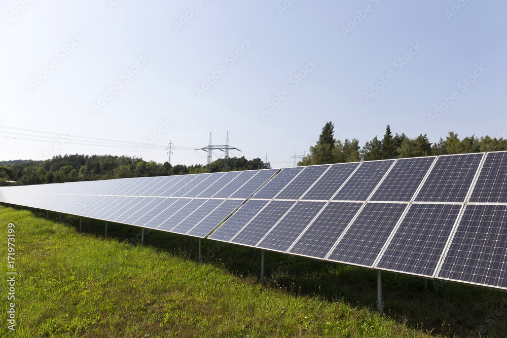 Fototapeta premium Solar Power Station on the summer Meadow 