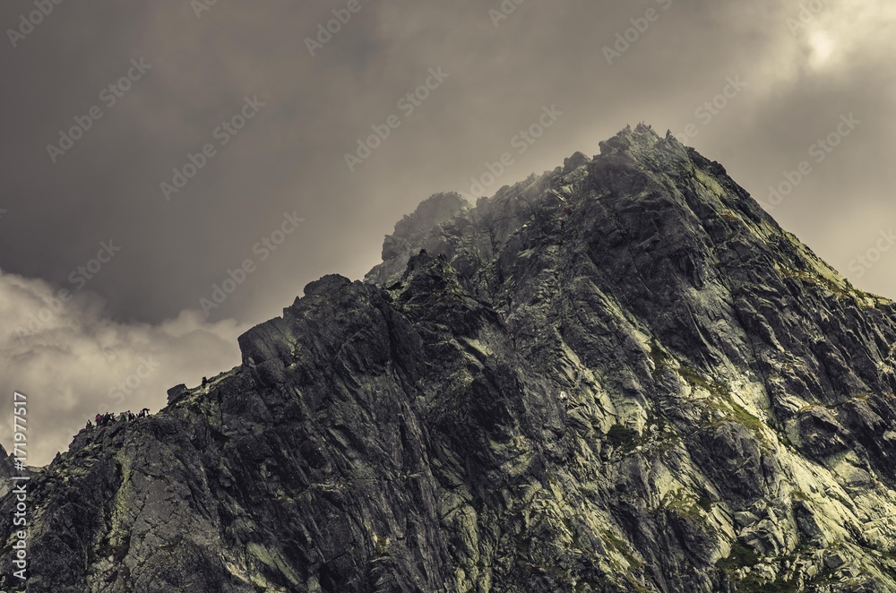 Obraz premium Tatra mountains landscape, Poland,Kozi Wierch peak under clouds