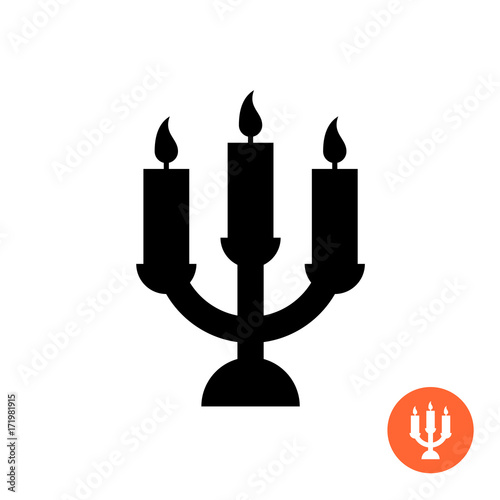Candle holder black silhouette icon.