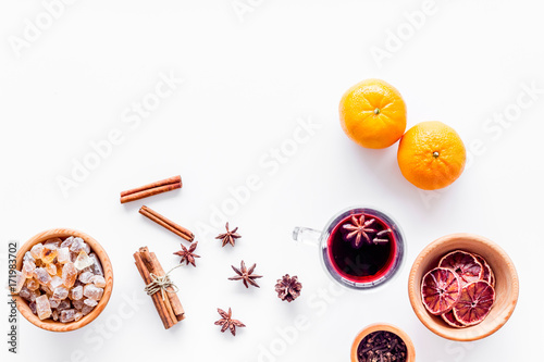 Celebrate new year winter evening with hot drink. Mulled wine or grog ingredients. White background top view. Space for text