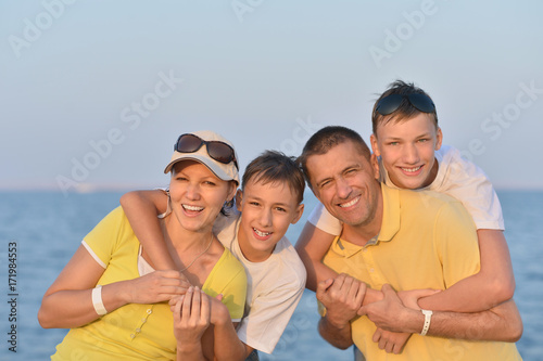 Family at beach in summer