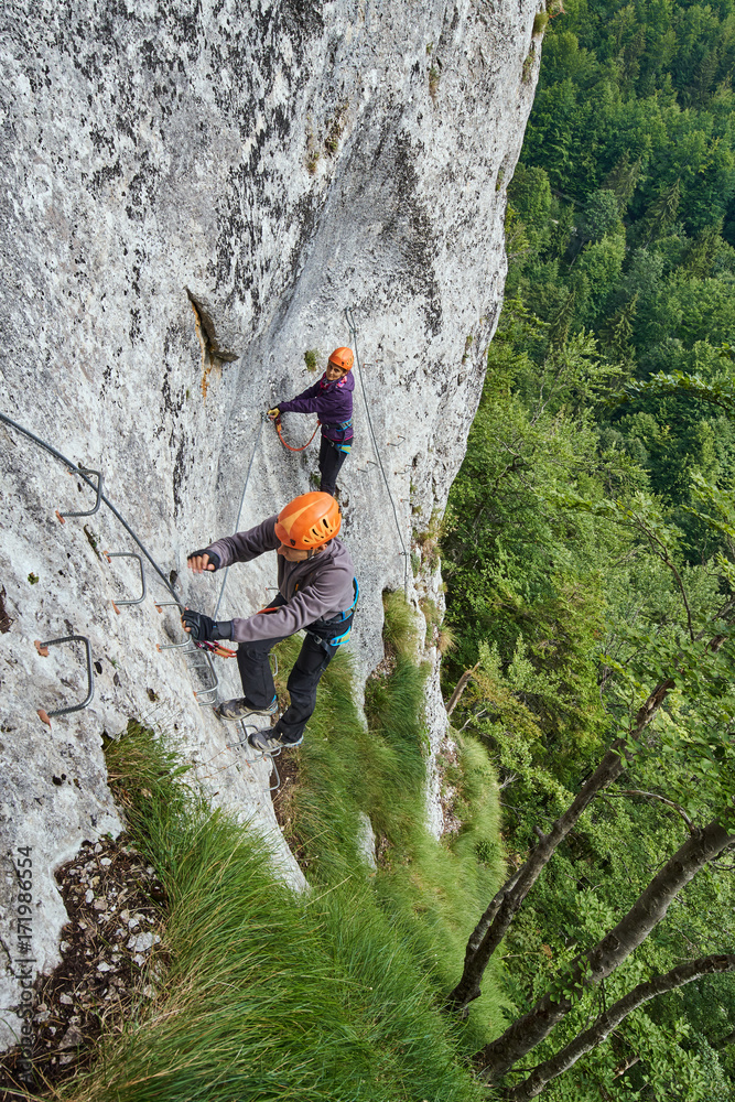 Fototapeta premium Climbing on via ferrata