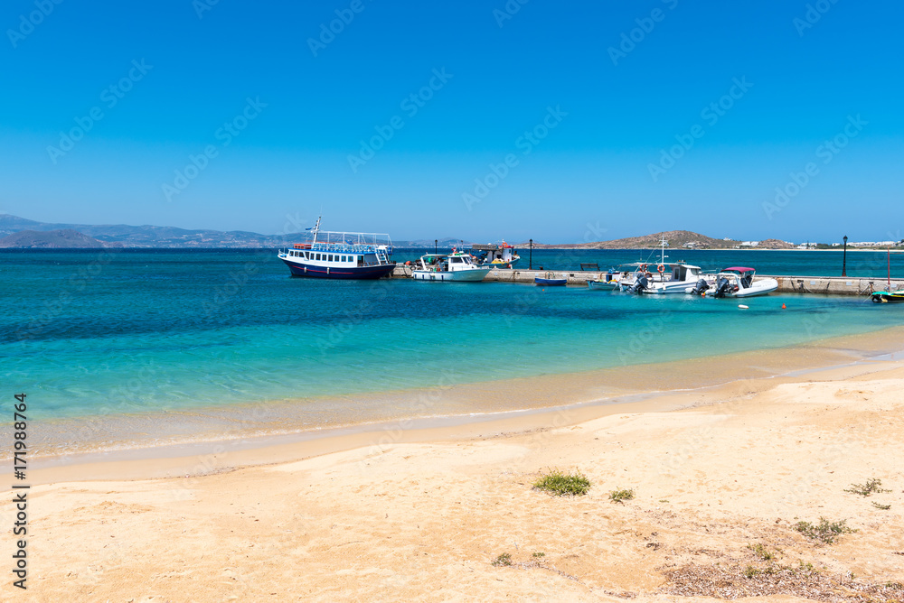 The picturesque port of Agia Anna,one of the most popular summer resorts of Naxos and located on the west side of island. Cyclades, Greece.
