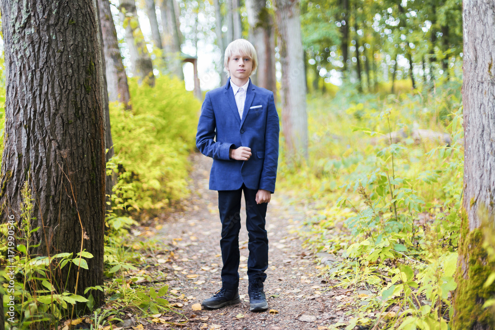 boy in autumn forest boy in autumn forest