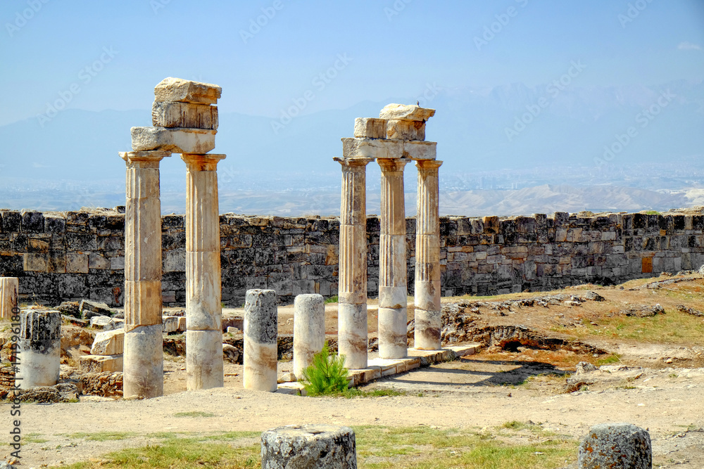 Beautiful view of ancient columns on sunny day