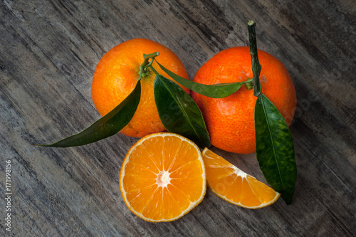 Mandarin, tangerine fruit placed on cutting board