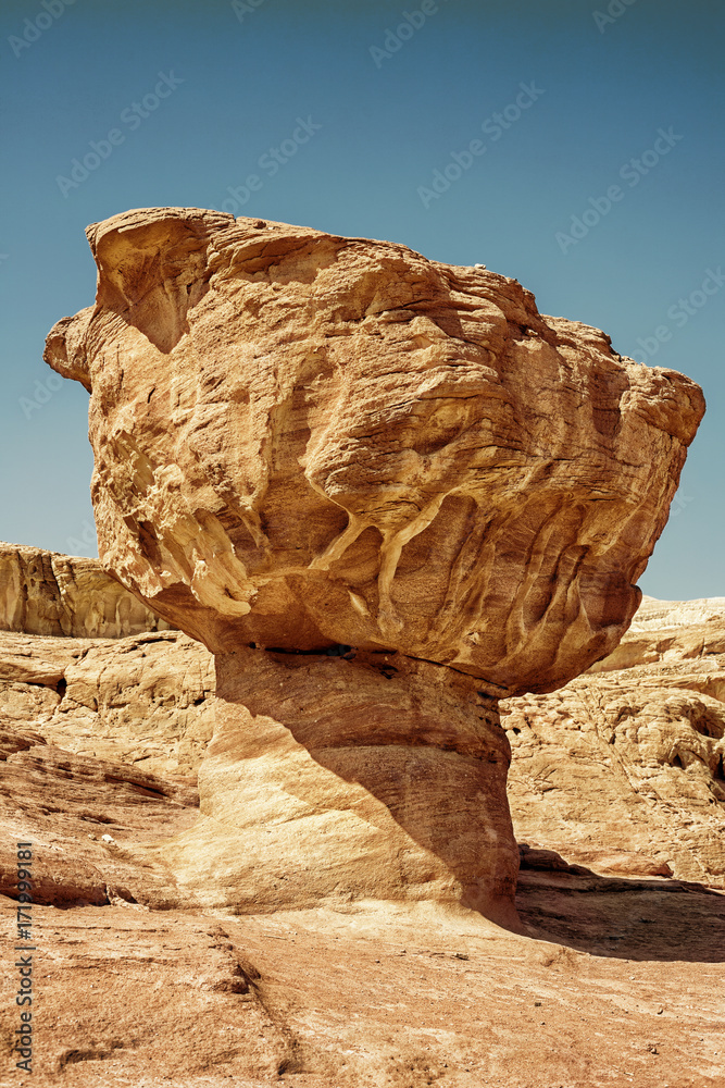 The Mushroom sandstone attraction width vivid blue sky from Timna National Park, Israel. HDR image with black gold filter