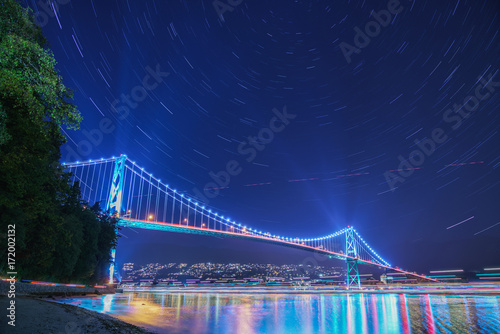 lions gate bridge and stars trail,Stanley park Vancouver Canada photo