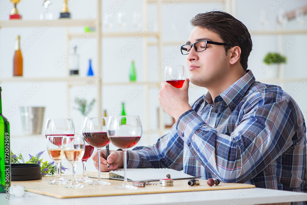 Professional sommelier tasting red wine Professional sommelier tasting red wine