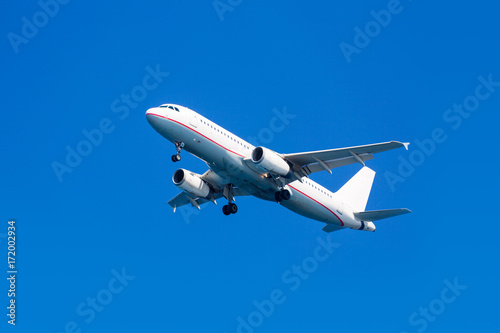 White airplane on a blue background,