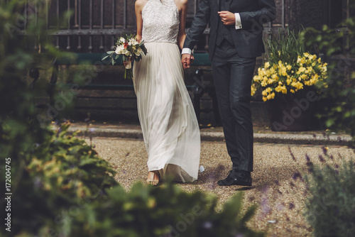 bridal couple, sensual bride and happy groom together