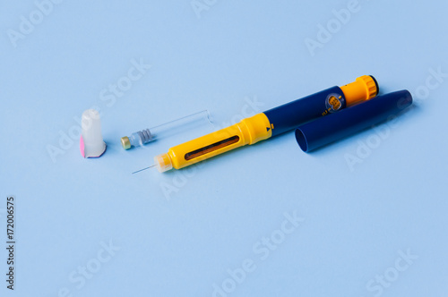A syringe for subcutaneous injection of hormonal drugs in the IVF protocol (in vitro fertilization). Medical product in ampoule. Preparation for pregnancy.