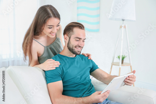 Happy young couple relaxing...