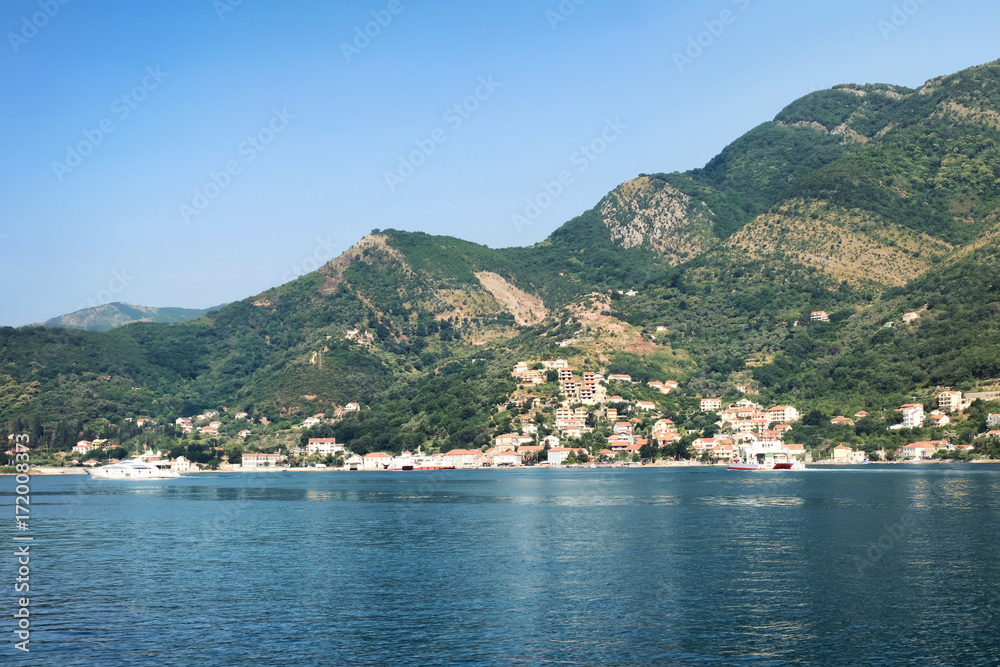 Picturesque view of small city on seashore
