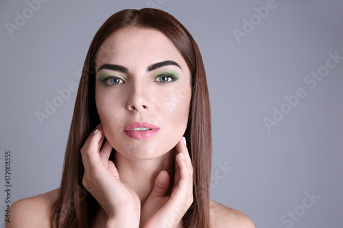 Young beautiful woman with ...