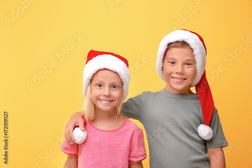 Cute children in Santa hats...