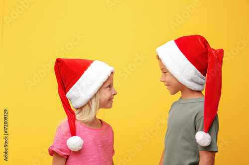 Cute children in Santa hats...