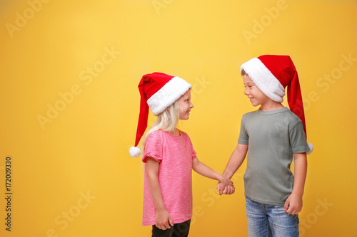 Cute children in Santa hats...