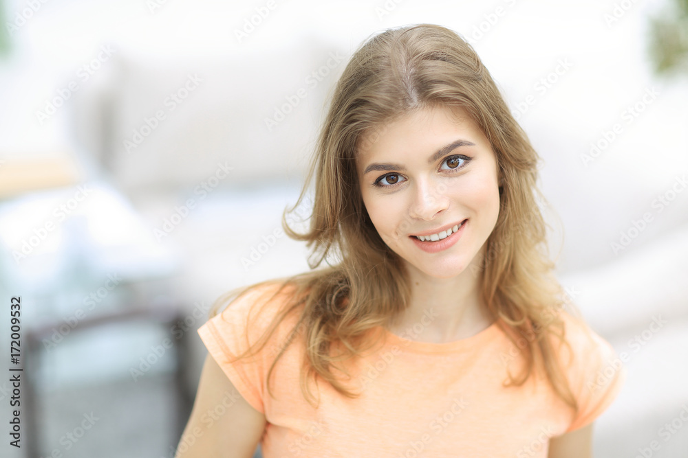 closeup portrait of a young woman on blurred background. closeup portrait of a young woman on blurred background.