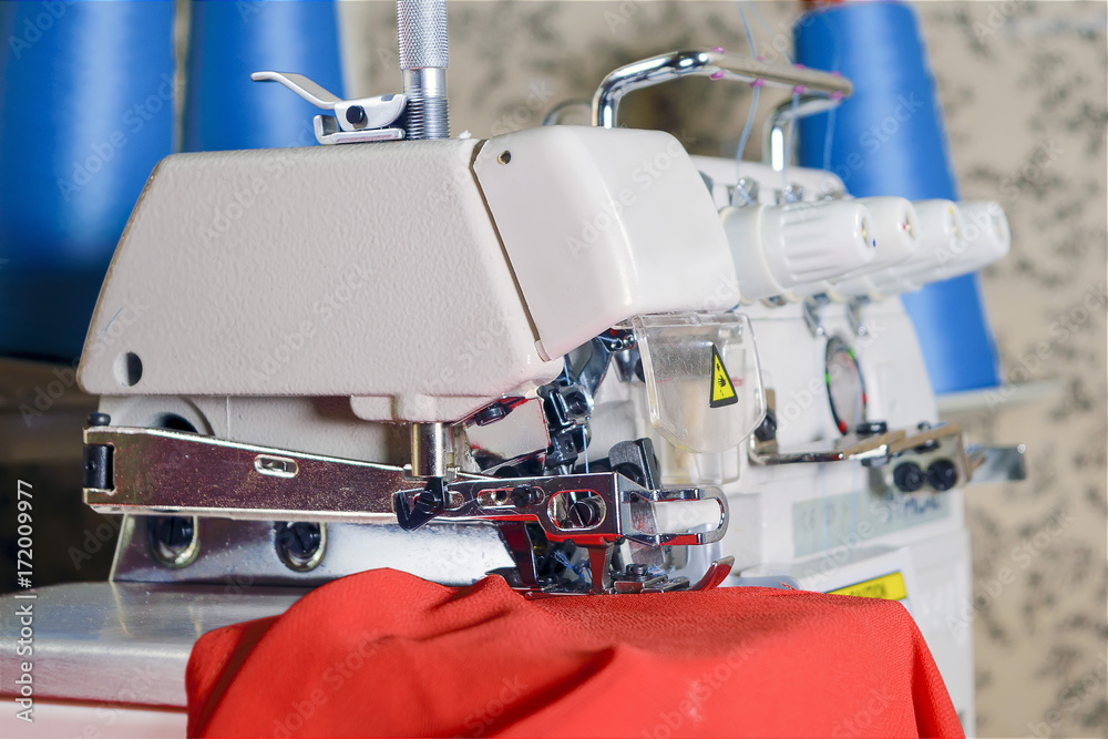 embroidery machine with red cloth