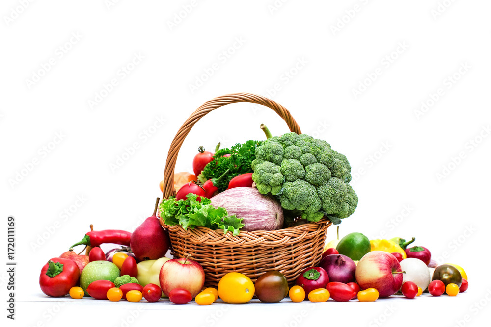 Vegetables and fruit in a basket isolated on white background. Vegetables and fruit in a basket isolated on white background.