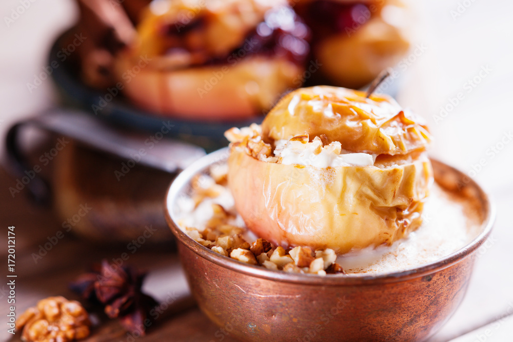 Fruit dessert baked apples in the pan 