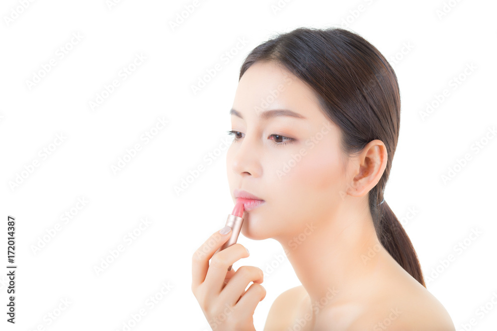 Lipstick makeup asian woman with lip balm care. Beauty Asian girl .on lips with happy. cosmetics beauty concept. Lipstick makeup asian woman with lip balm care. Beauty Asian girl .on lips with happy. cosmetics beauty concept.